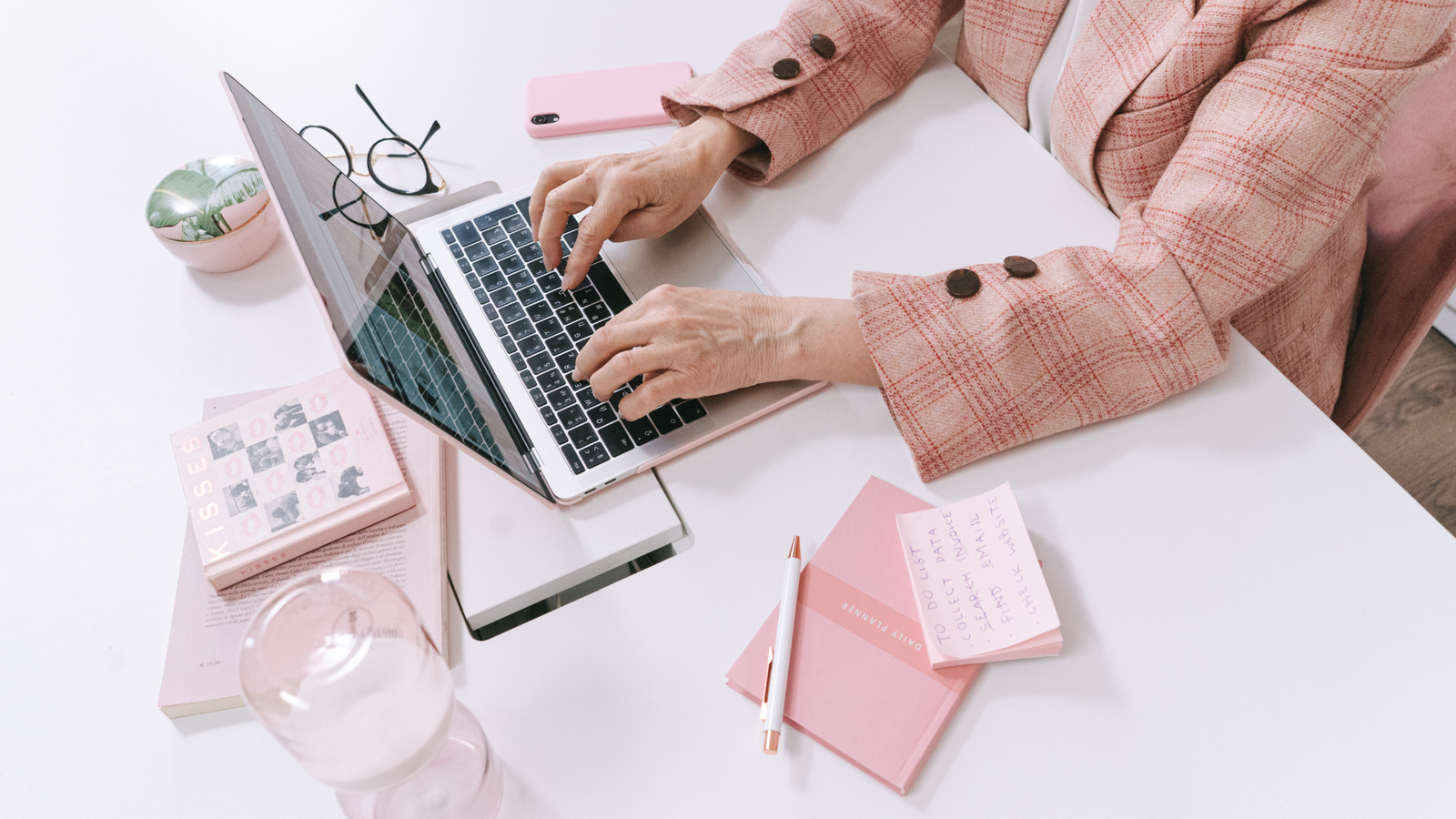 a person blogging on a laptop